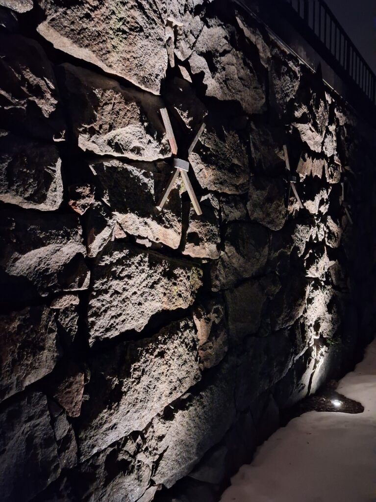 Stone wall at night symbolizing print on demand setbacks and obstacles in ExitLab Project #1.